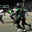 Turnovers Haunt Phantomz as Renegades Roll to Victory 41-6 Renegades #53 Deanna Walsh hits Philadelphia quarterback Satoria Bell as she attempts a forward pass.