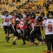Boston Chains Down L.A. Run Game, Locks Up National Championship Boston Renegades defenders gang tackle a Los Angeles Warriors ball carrier.