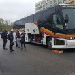 On the road with the best team in women’s football <nobr>(WGBH News)</nobr> Players load on to passenger bus