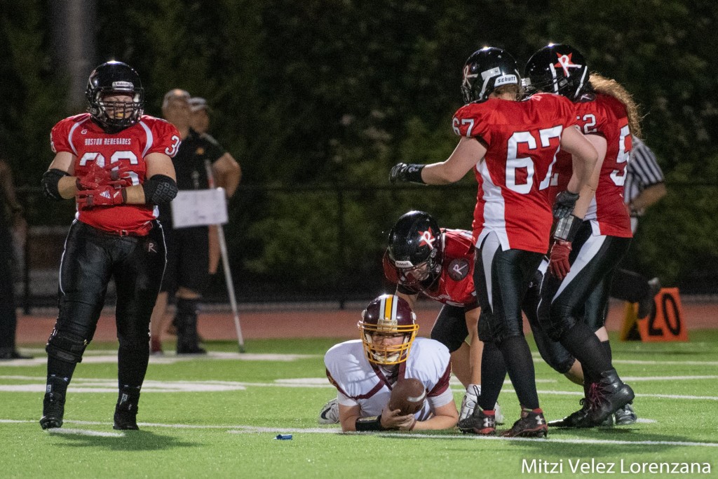 Boston Renegades defenders Charlene Casey, Danielle Fournier, Kristen Sarson, and Allie Genereux surround D.C. Divas quarterback Amanda Congialdi when the teams played on June 15, 2019. Boston won 62-32. ©2019 Mitzi Vélez Lorenzana