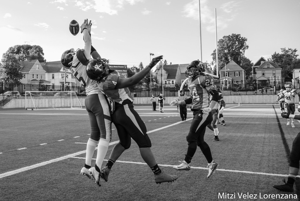 Satoria Bell #4 tips away a pass intended for a D.C. Divas receiver. Bell also scored three touchdowns on offense for the Boston Renegades when the teams met on 6/15/2019. ©2019 Mitzi Vélez Lorenzana