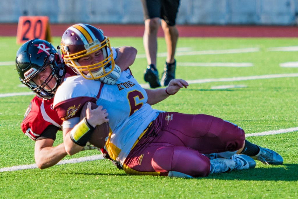 Boston Renegades defensive end Danielle Fournier #70 sacks D.C. Divas quarterback Amanda Congialdi. Β©2019 Mitzi VΓ©lez Lorenzana