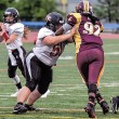 Jewish players help raise women’s football league trophy <nobr>(The Jewish Advocate)</nobr> Boston Renegades offensive linewoman Amanda Alpert protects quarterback Allison Cahill from a D.C. Divas defender. <nobr>© Mitzi Vélez Lorenzana</nobr>
