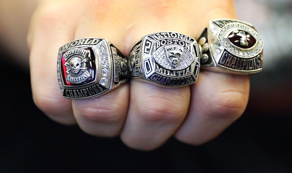 Amanda Alpert flashed her championship rings from 2010, 2011, and 2014, but still has room for rings for the 2018 and 2019 championships. Pat Greenhouse/Globe Staff