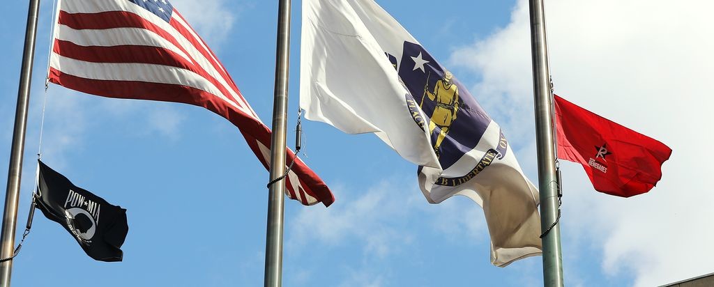 The Renegades’ flag was flown outside city hall. Pat Greenhouse/Globe Staff
